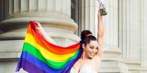 Bride wearing a pride scarf